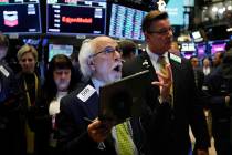 Trader Peter Tuchman works on the floor of the New York Stock Exchange, Thursday, June 20, 2019 ...