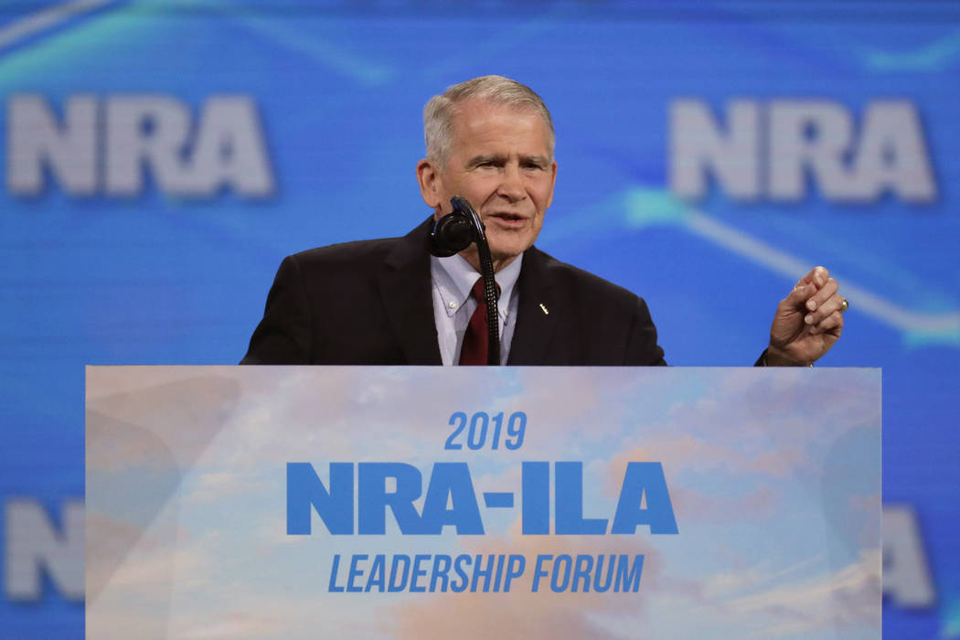 FILE- In this April 26, 2019 photo, Nation Rifle Association President Col. Oliver North speaks ...