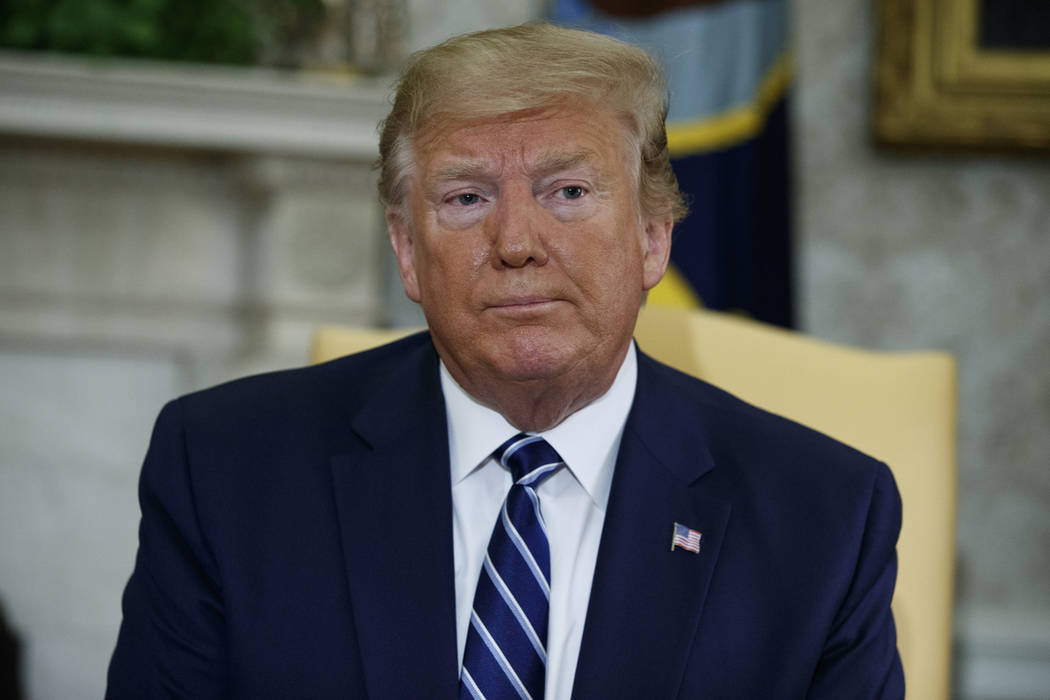 President Donald Trump listens to a question during a meeting with Canadian Prime Minister Just ...