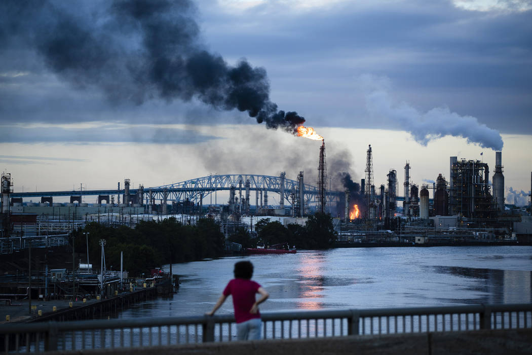 Flames and smoke emerge from the Philadelphia Energy Solutions Refining Complex in Philadelphia ...