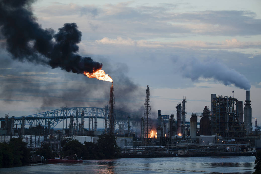 Flames and smoke emerge from the Philadelphia Energy Solutions Refining Complex in Philadelphia ...