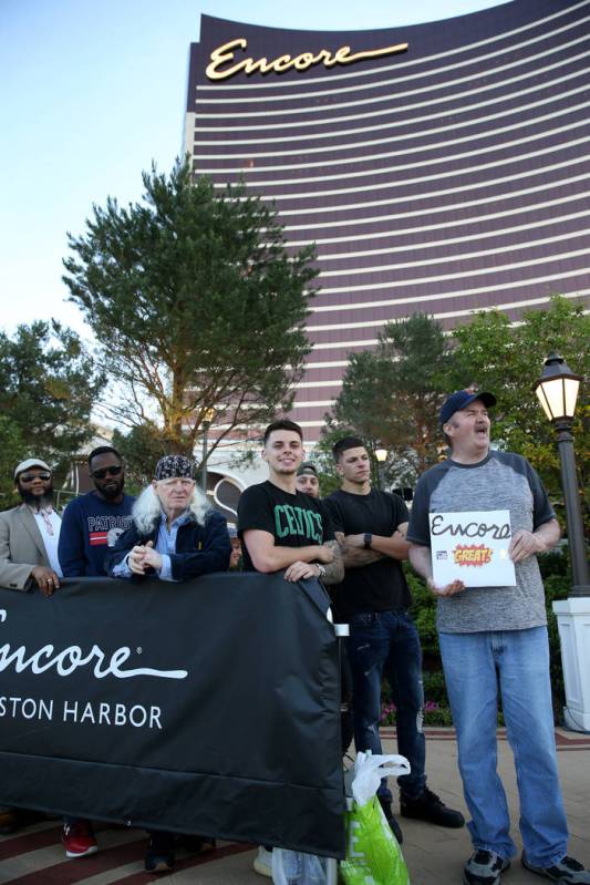 Glenn Reynolds, of Quincy, Mass., right, is first in line for the opening of the $2.6 billion E ...