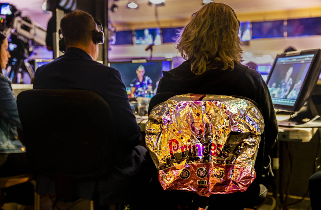 Announcer and former pro player Kelly Kulick has a princess balloon attached to her chair durin ...