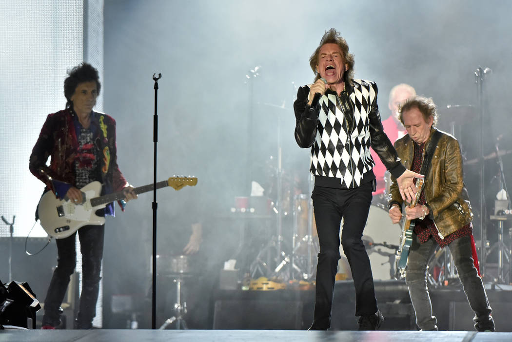 Mick Jagger, Charlie Watts, and Keith Richards of The Rolling Stones performs during the &quot ...