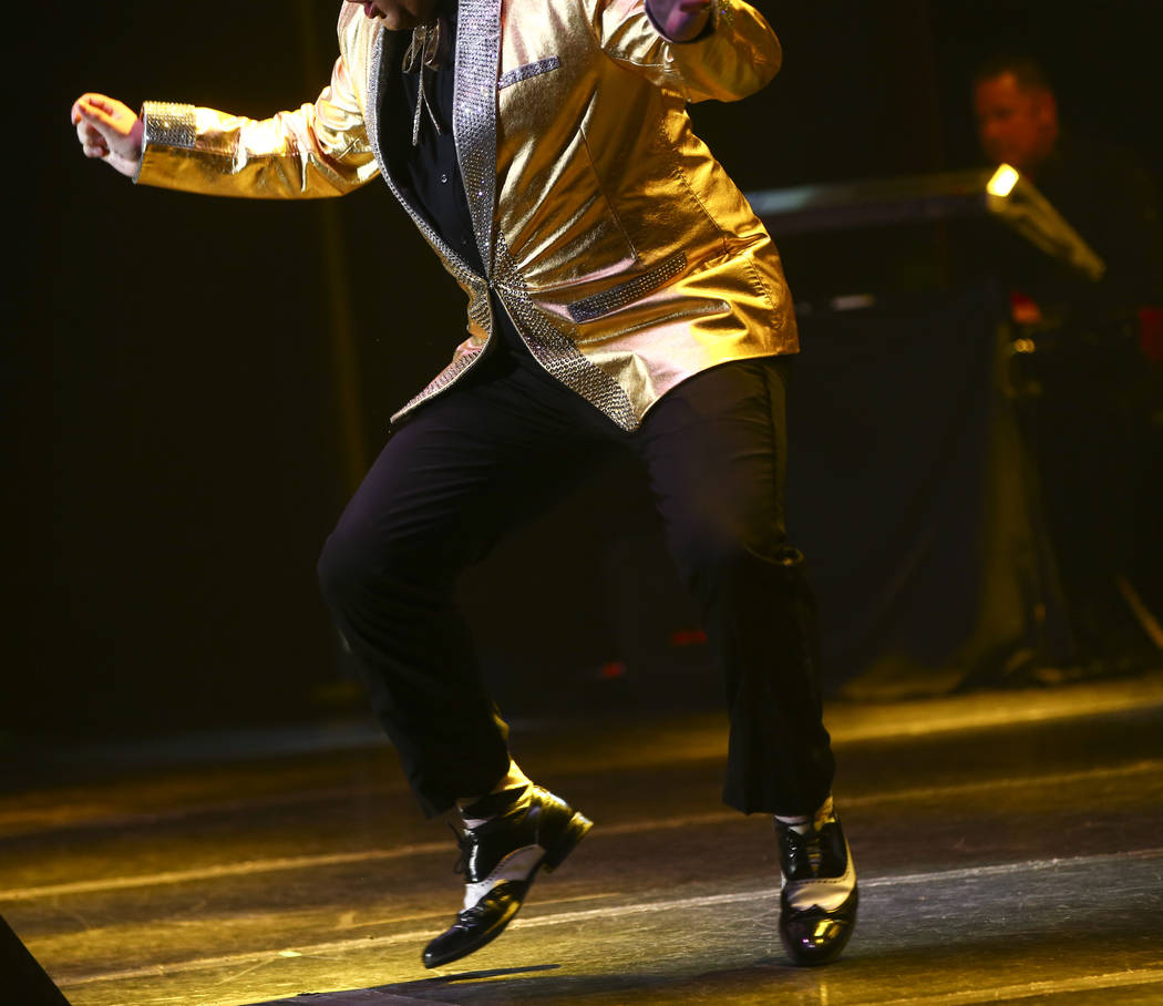 Richard Wolfe, of Ontario, Canada, performs in the '50s era competition during the 10th annual ...