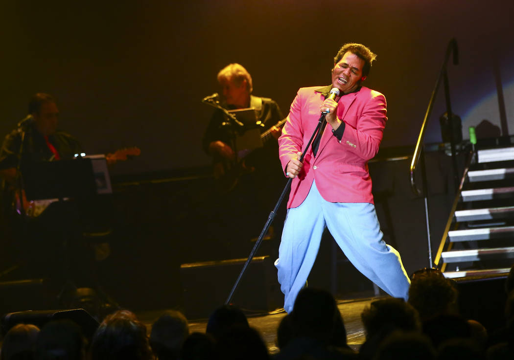 Robert Washington, of Auburn, Maine, performs in the '50s era competition during the 10th annua ...