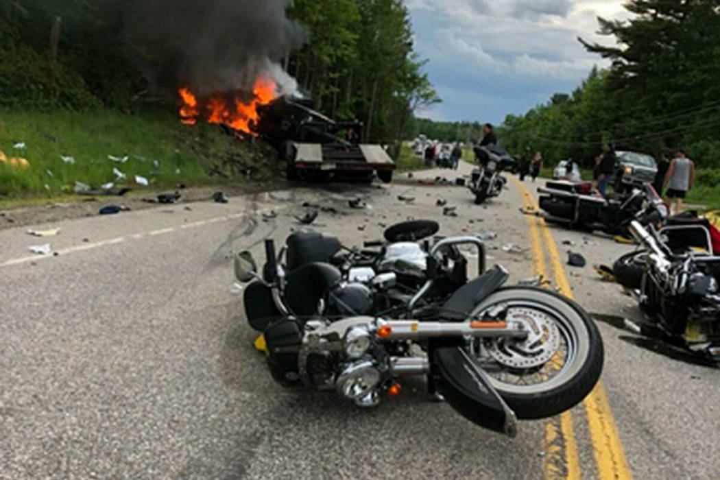 This photo provided by Miranda Thompson shows the scene where several motorcycles and a pickup ...