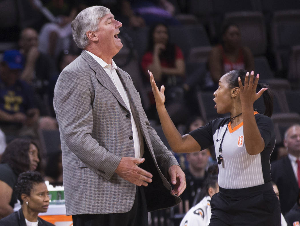 Las Vegas Aces head coach Bill Laimbeer, left, argues a call in the second quarter during Vegas ...