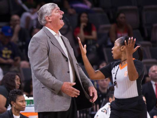Las Vegas Aces head coach Bill Laimbeer, left, argues a call in the second quarter during Vegas ...