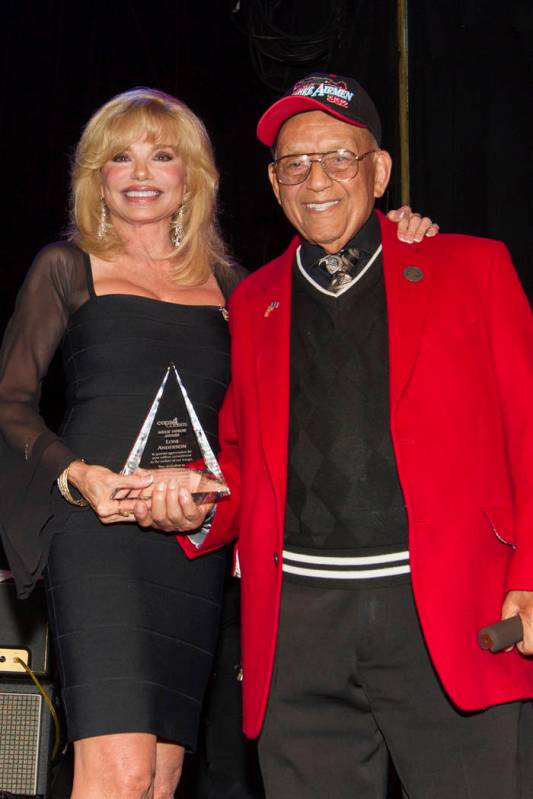 FILE - In this Sept. 11, 2013 file photo, actress Loni Anderson, left, receives the Millie Tayl ...