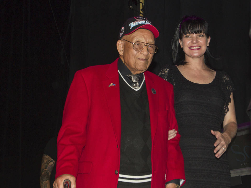 FILE - In this Sept. 11, 2013 file photo, actress Pauley Perrette, right, and Lt. Col. Bob Frie ...