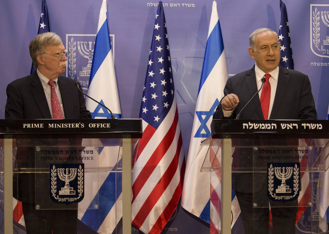 Israeli Prime Minister Benjamin Netanyahu, right, U.S. National Security Advisor John Bolton gi ...