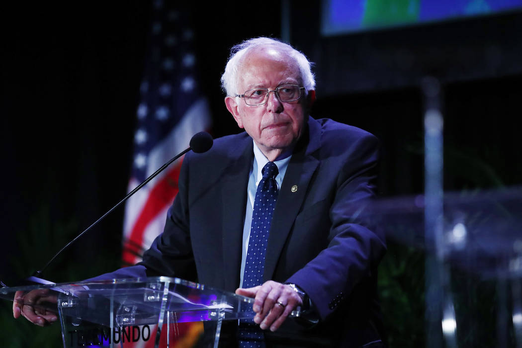 Democratic presidential candidate Sen. Bernie Sanders, I-Vt., pauses while speaking during a fo ...