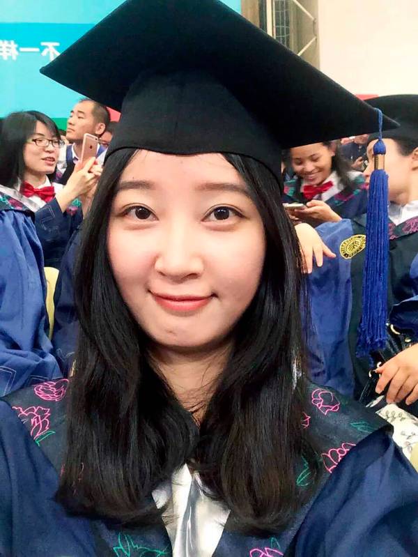 FILE - This 2016 selfie provided by her family shows Yingying Zhang in a cap and gown for her g ...