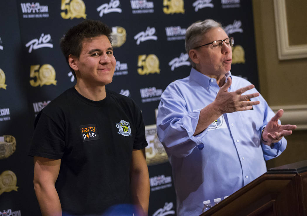 Las Vegas resident and "Jeopardy!" sensation James Holzhauer, left, looks on as Poker ...