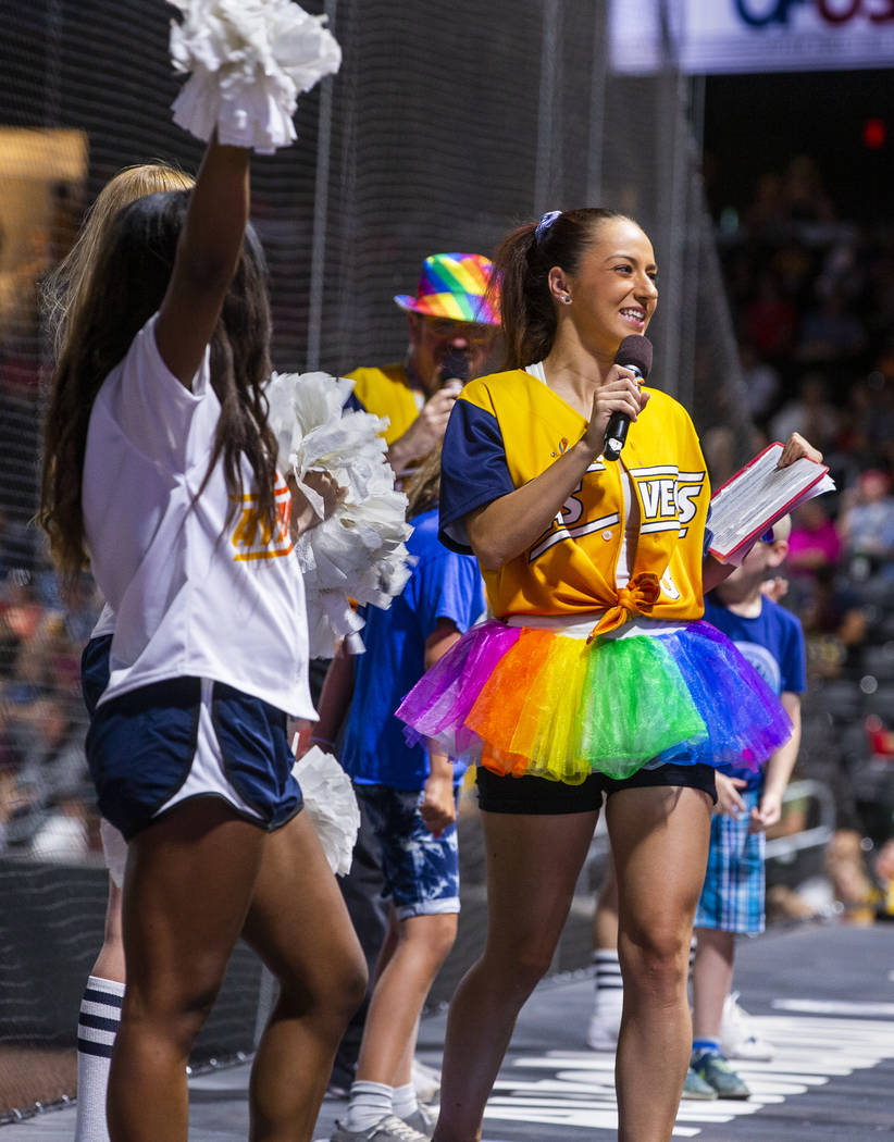 Aviators on-field emcee Katie Greener sports a rainbow tutu while working the crowd during Prid ...