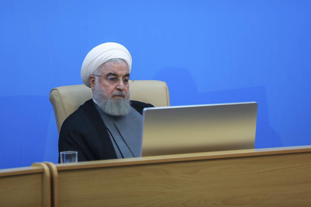 In this photo released by the official website of the office of the Iranian Presidency, Preside ...