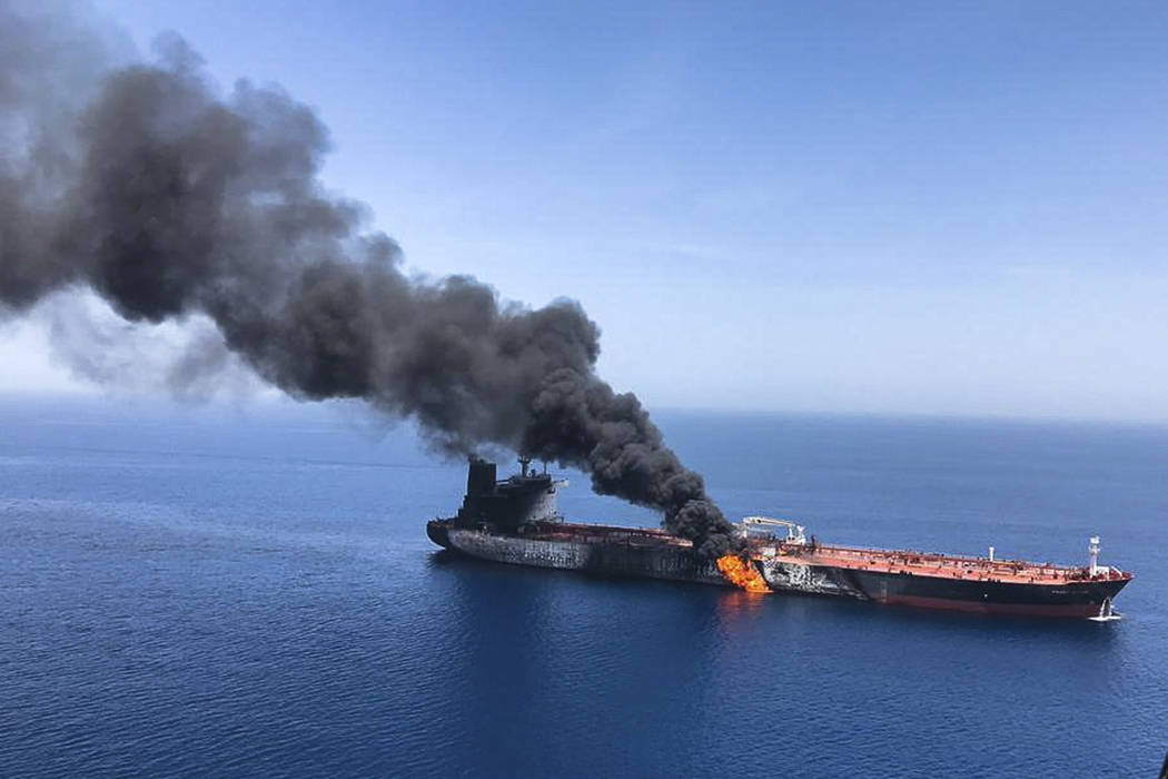 FILE - In this Thursday, June 13, 2019 file photo, an oil tanker is on fire in the sea of Oman. ...