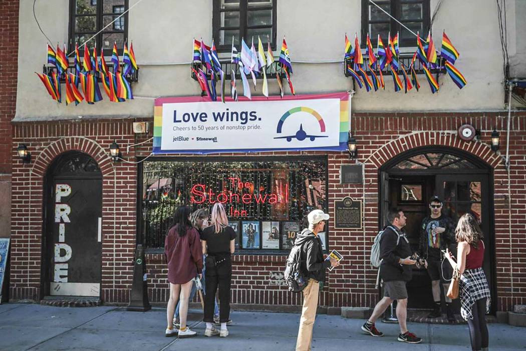 Pride flags and pride colors display on the Stonewall Inn bar on June 3, 2019, marking the sit ...