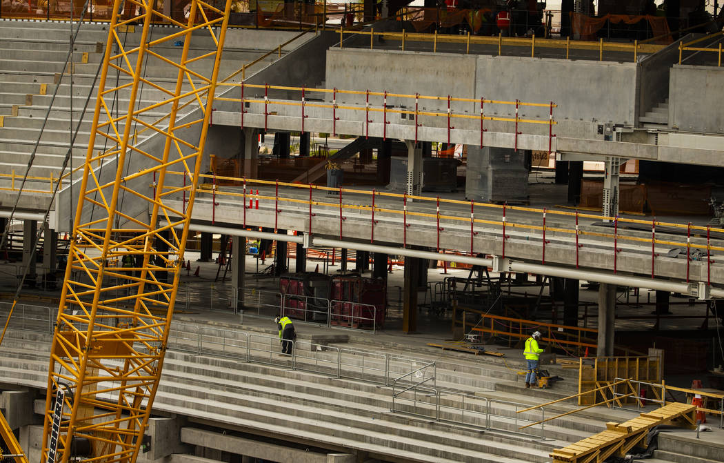 Platforms are being installed which will hold seating in the Raiders Stadium as construction co ...