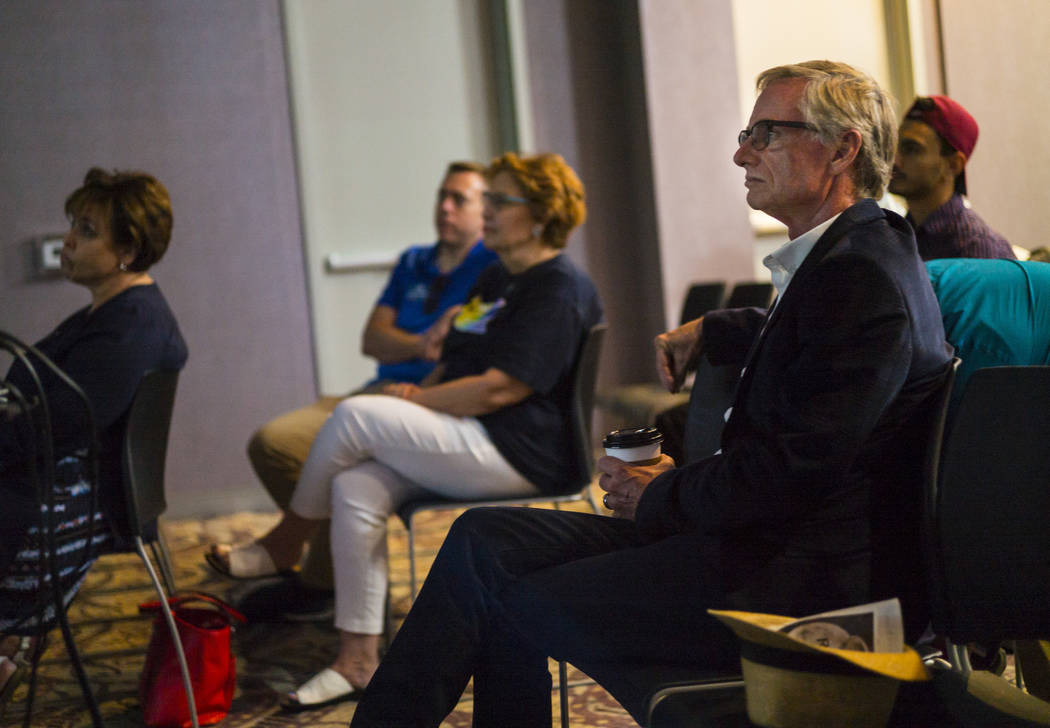 Steven Tomlinson, president of the Stonewall Democratic Club of Southern Nevada, watches the De ...