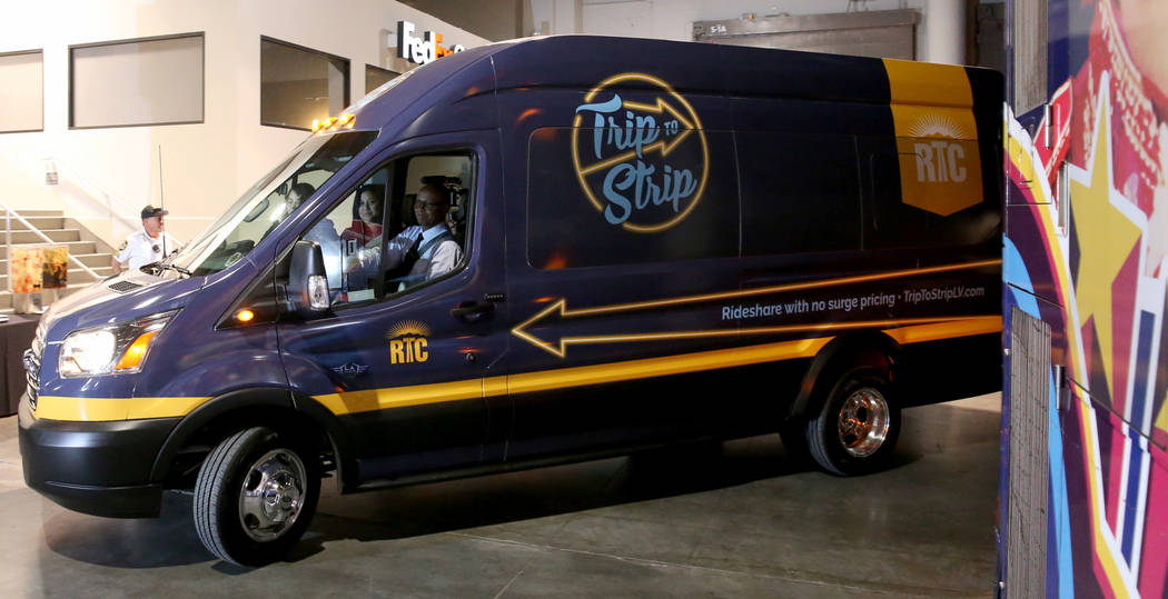 An 11-passenger shuttle pulls into the South Hall at the Las Vegas Convention Center during the ...