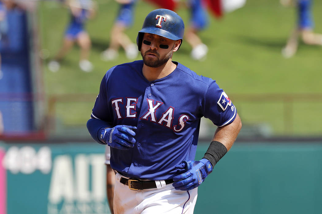 Texas Rangers' Joey Gallo rounds the bases after hitting a two-run home run off of Kansas City ...