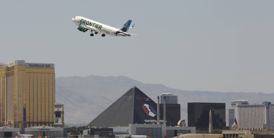 A Frontier airlines flight departs for takeoff at McCarran International Airport on Wednesday, ...