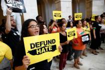 Protesters gather to demand the defunding of government agencies for border protection and cust ...