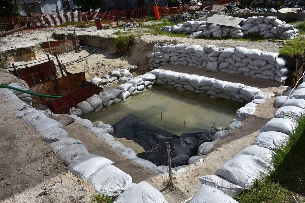 A June 1, 2019 photo provided by History Flight shows graves of U.S. servicemen under the wate ...