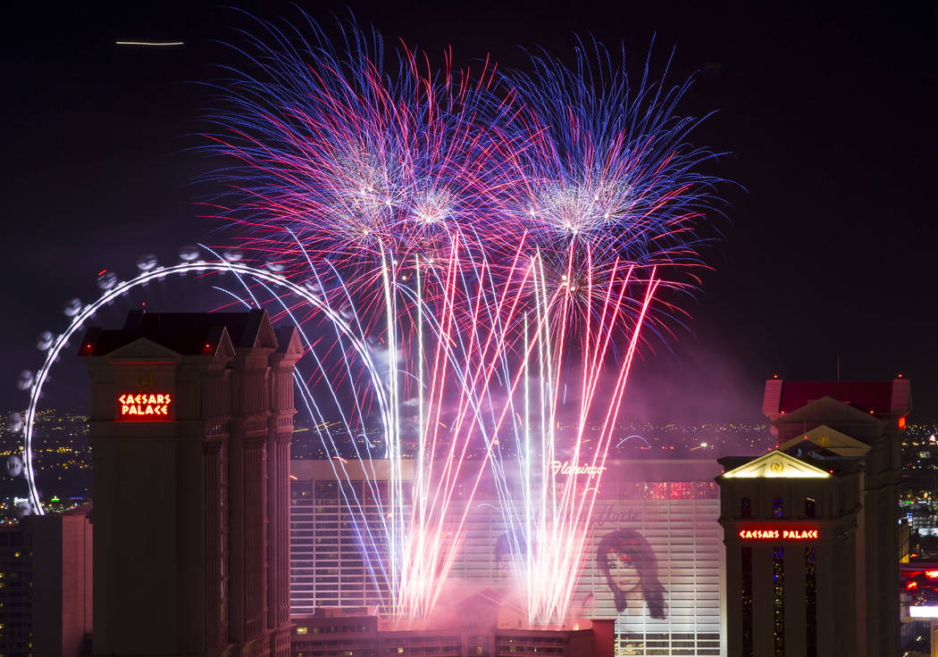 A fireworks show goes off from the Julius Tower at Caesars Palace on The Strip to kick off a we ...