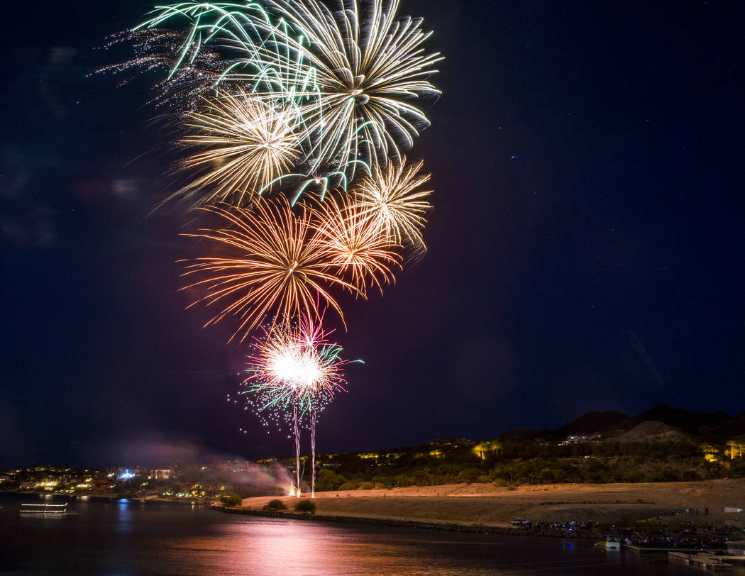 A fireworks display during Fourth of July weekend celebrations at Lake Las Vegas on Sunday, Jul ...