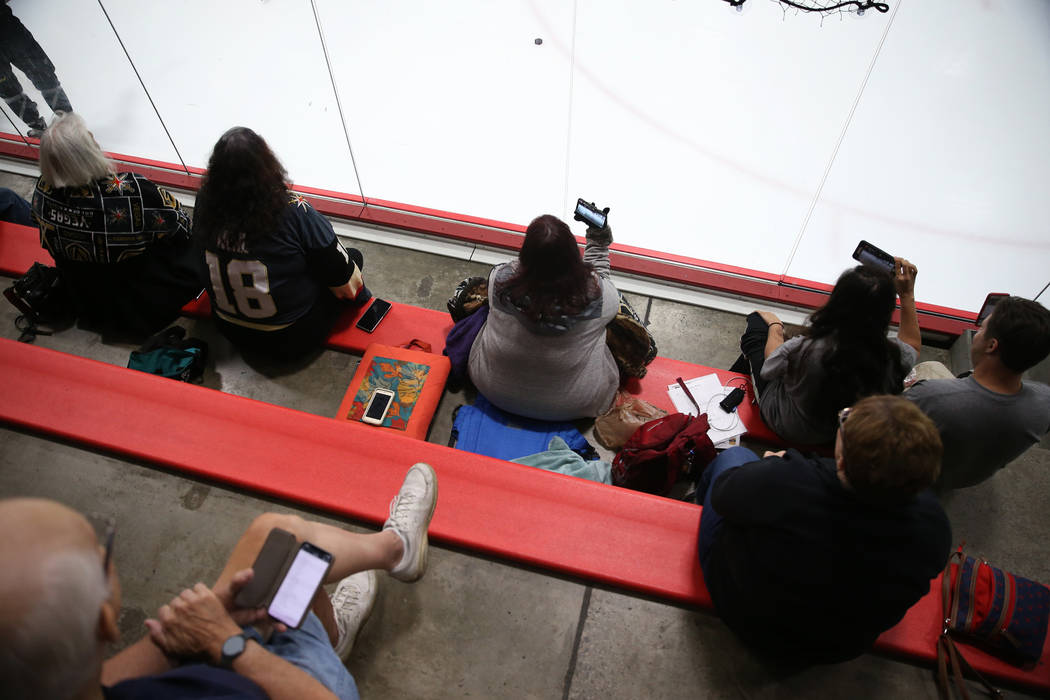 Fans watch the Vegas Golden Knights during a team practice at City National Arena in Las Vegas, ...