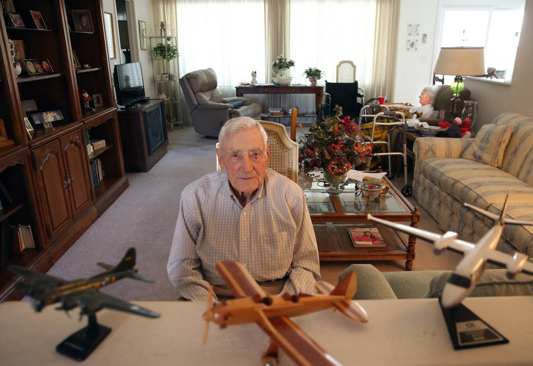 U. S. Army Air Corps and the U.S. Air Force pilot James Parker, 97, poses for a photo at his La ...