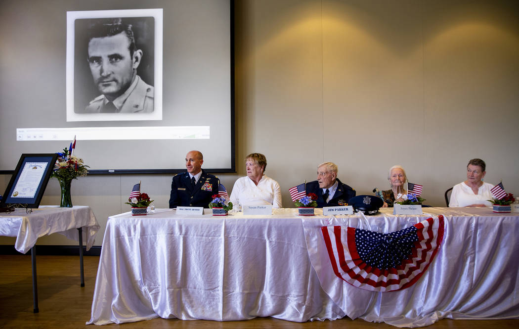 Family members, from left, Trent Arnold, Susan Parker, James "Jim" A. Parker and wife ...