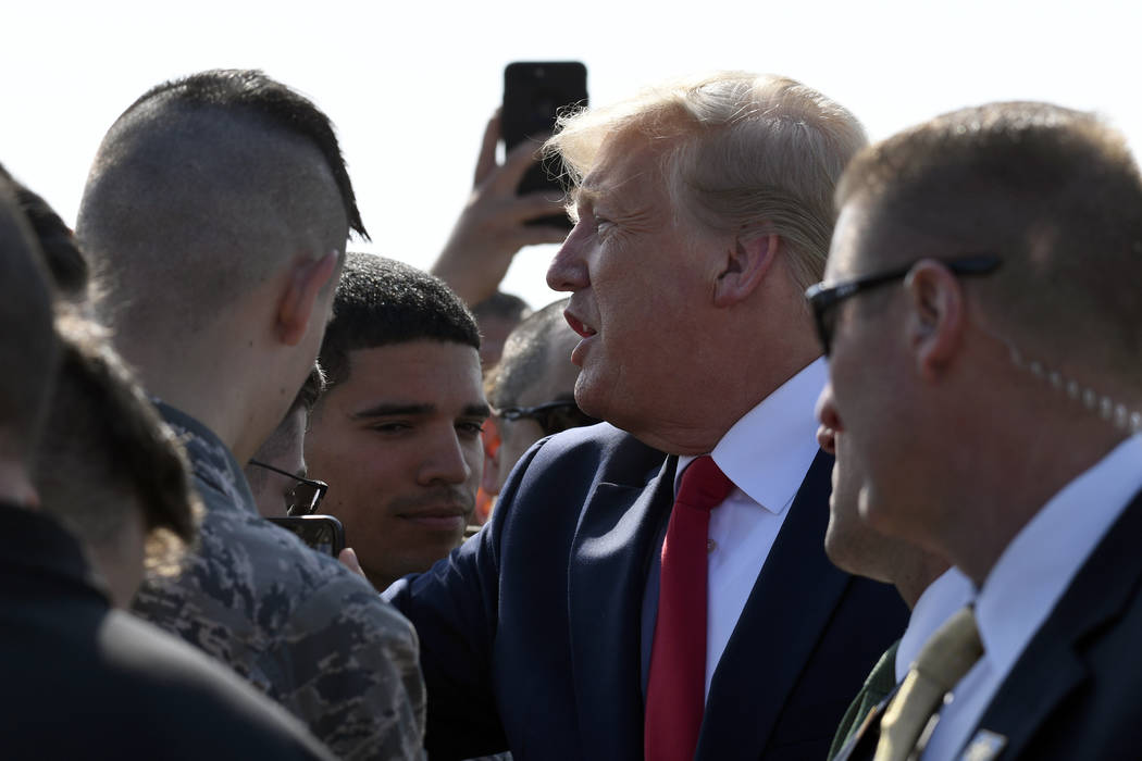 President Donald Trump greets troops at Elmendorf Air Force Base in Anchorage, Alaska, Wednesda ...