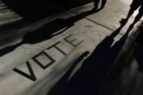 In a Nov. 6, 2018, file photo, voters head to the polls at the Enterprise Library, in Las Vega ...