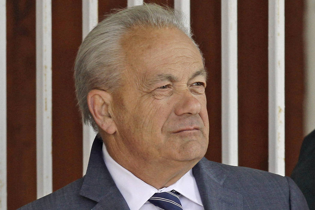 In this March 22, 2014, file photo, horse trainer Jerry Hollendorfer stands in the paddock at T ...