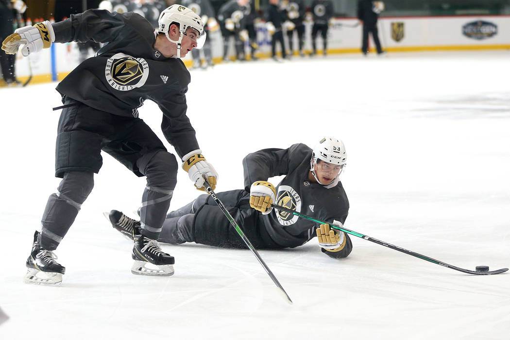 Vegas Golden Knights Marcus Kallionkieli (53), right, reaches for the puck on offense against M ...