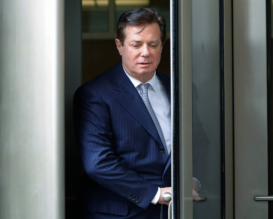 FILE - In this Feb. 14, 2018, file photo, Paul Manafort leaves the federal courthouse in Washin ...