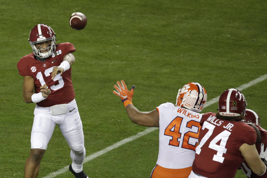 Alabama's Tua Tagovailoa throws during the first half the NCAA college football playoff champio ...