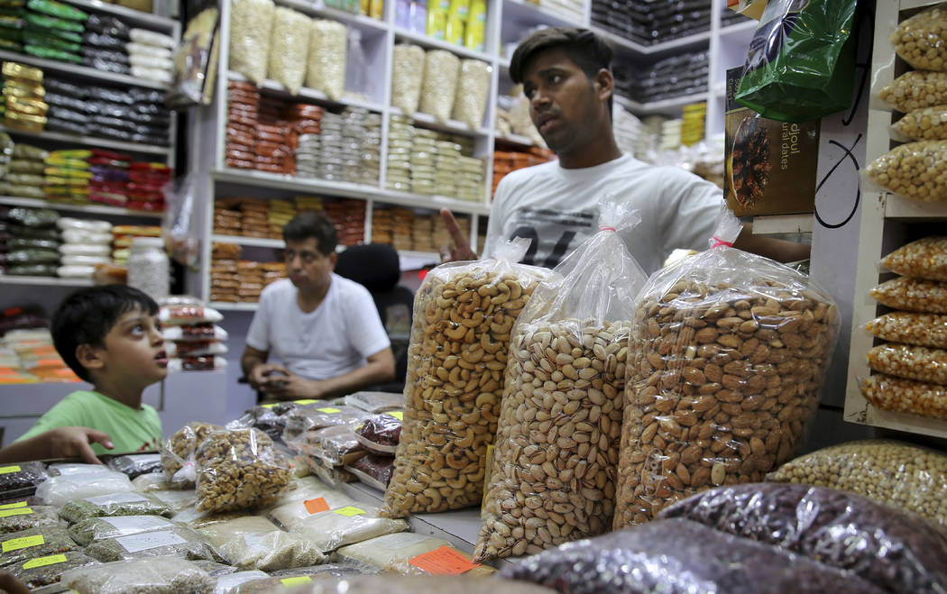 In this Sunday, June 23, 2019 photo, Californian almond kernels and other dry fruit are stored ...