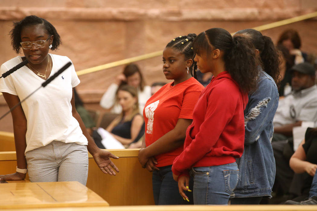 Shadow Ridge High School 2019 graduate Vashay Young, left, speaks during a Clark County School ...