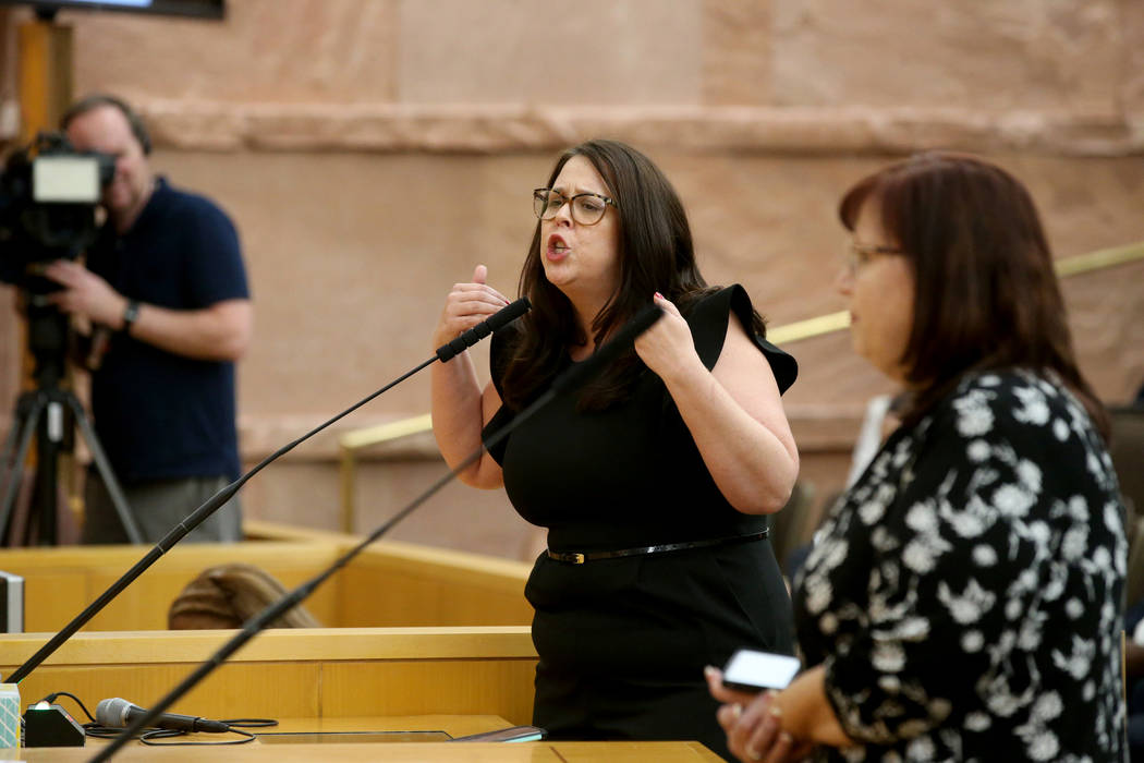 Parent and Leavitt Middle School teacher Alexis Salt speaks a Clark County School Board meeting ...