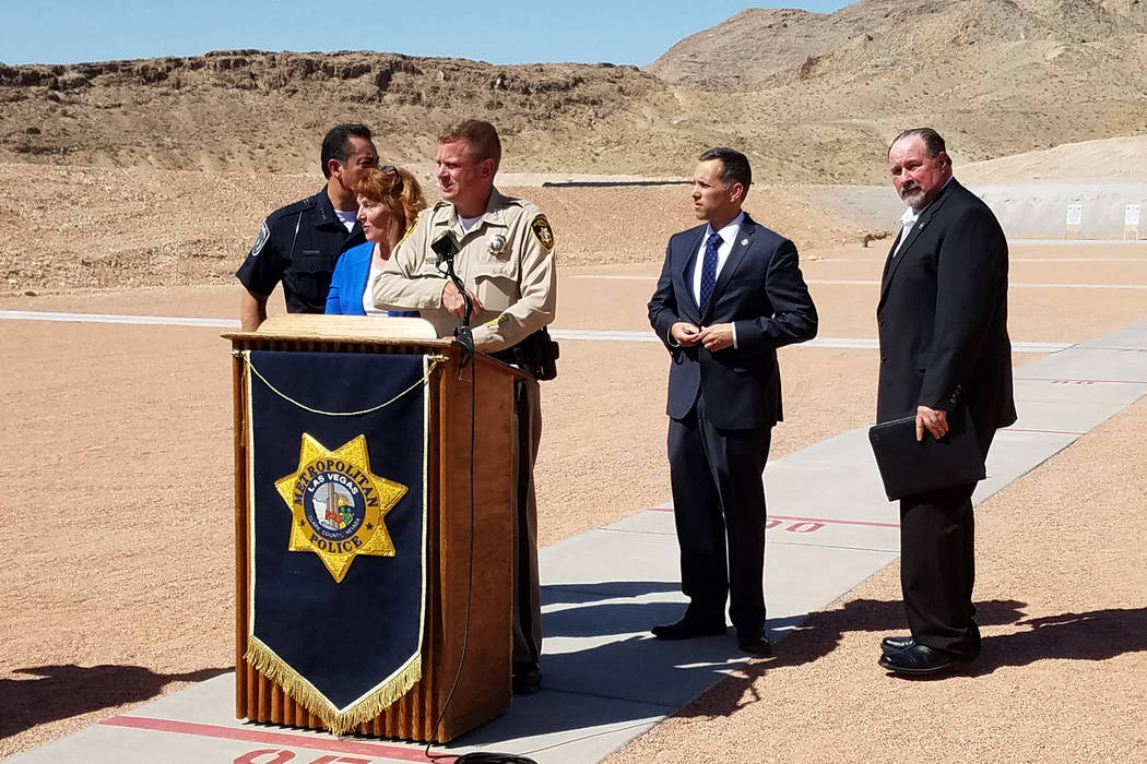 Clark County Undersheriff Kevin McMahill, third from left, speaks during an event held Thursday ...