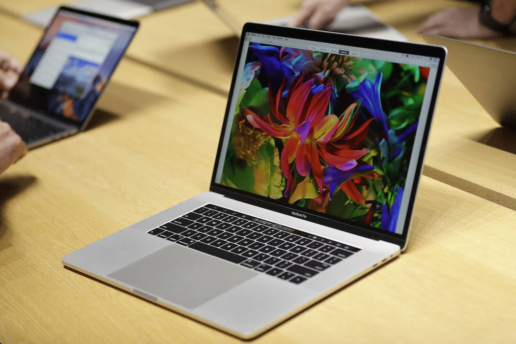 MacBook computers are shown in a demo room following the announcement of new products at Apple ...