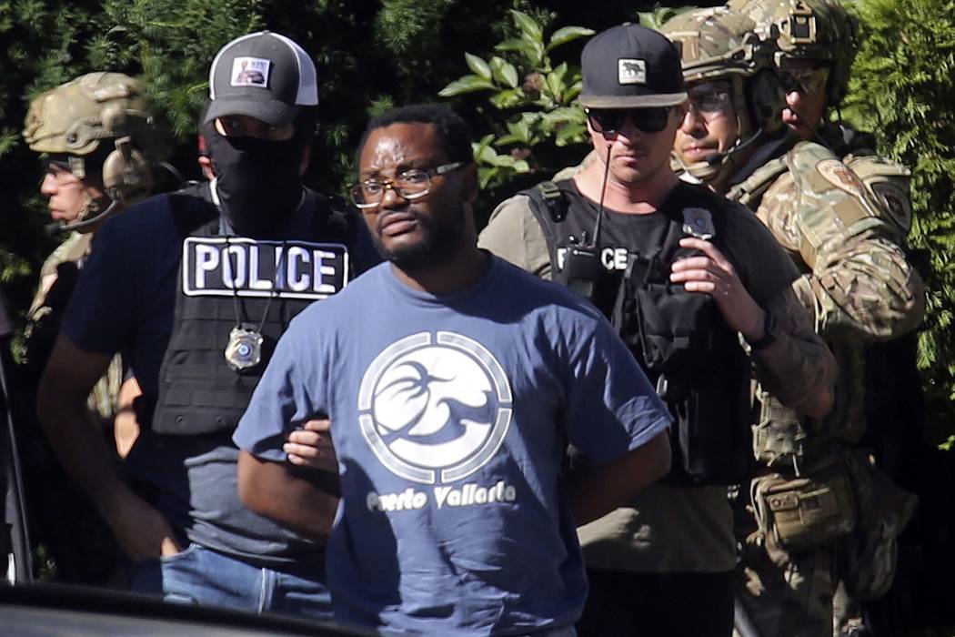 Salt Lake City police take 31-year-old Ayoola A. Ajayi into custody in connection with missing ...