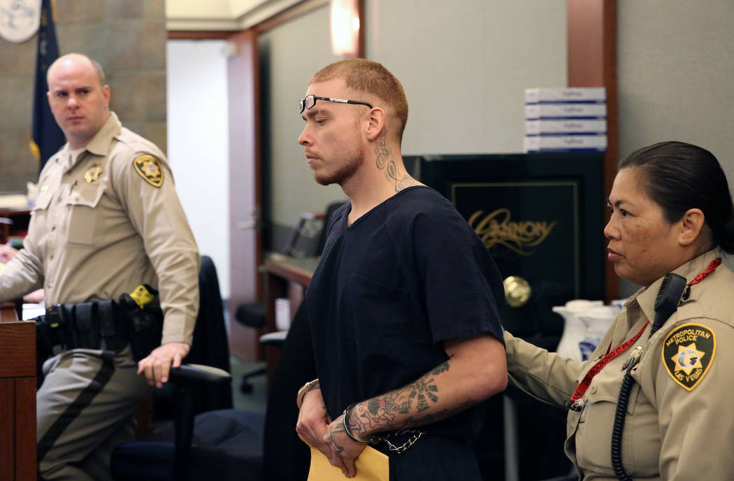 Jon Kennison, 27, led into the courtroom at the Regional Justice Center in Las Vegas on Thursda ...