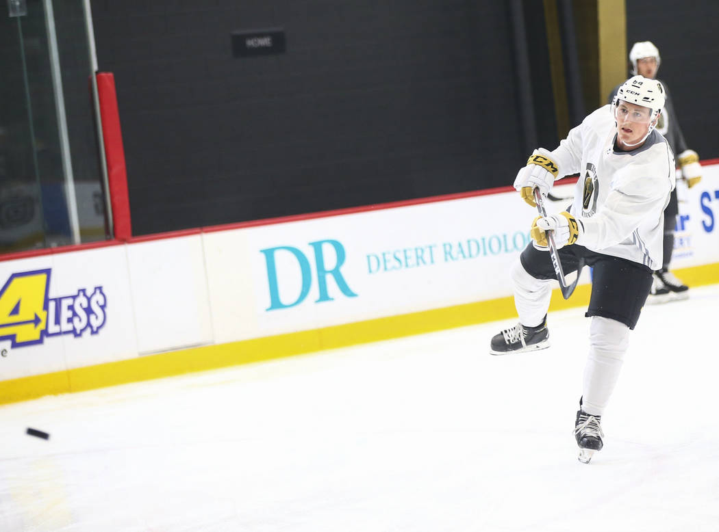 Golden Knights prostect Ben Jones (64) shoots the puck during the first day of development camp ...
