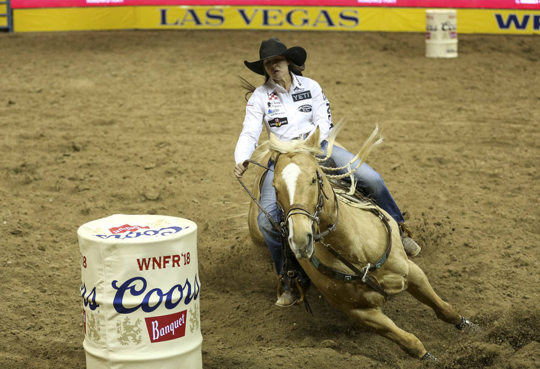 Hailey Kinsel of Cotulla, Texas (53) competes in the barrel racing event during the ninth go-ro ...